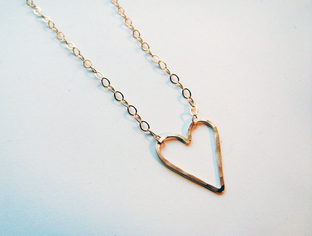 Delicate gold heart necklace. Handmade simple necklace.