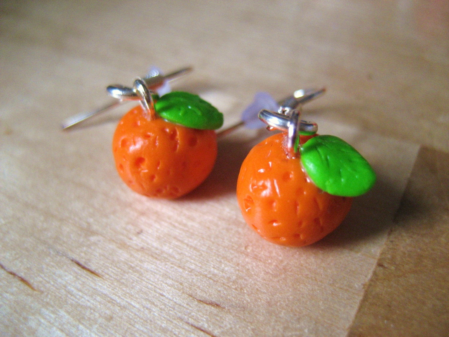 Orange fruit earrings made from polymer clay
