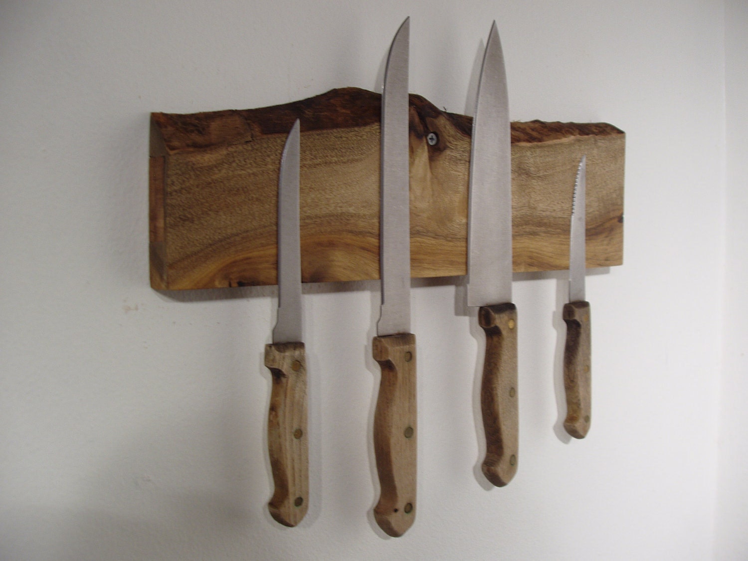 Live edge magnetic knife rack in knotty Alder