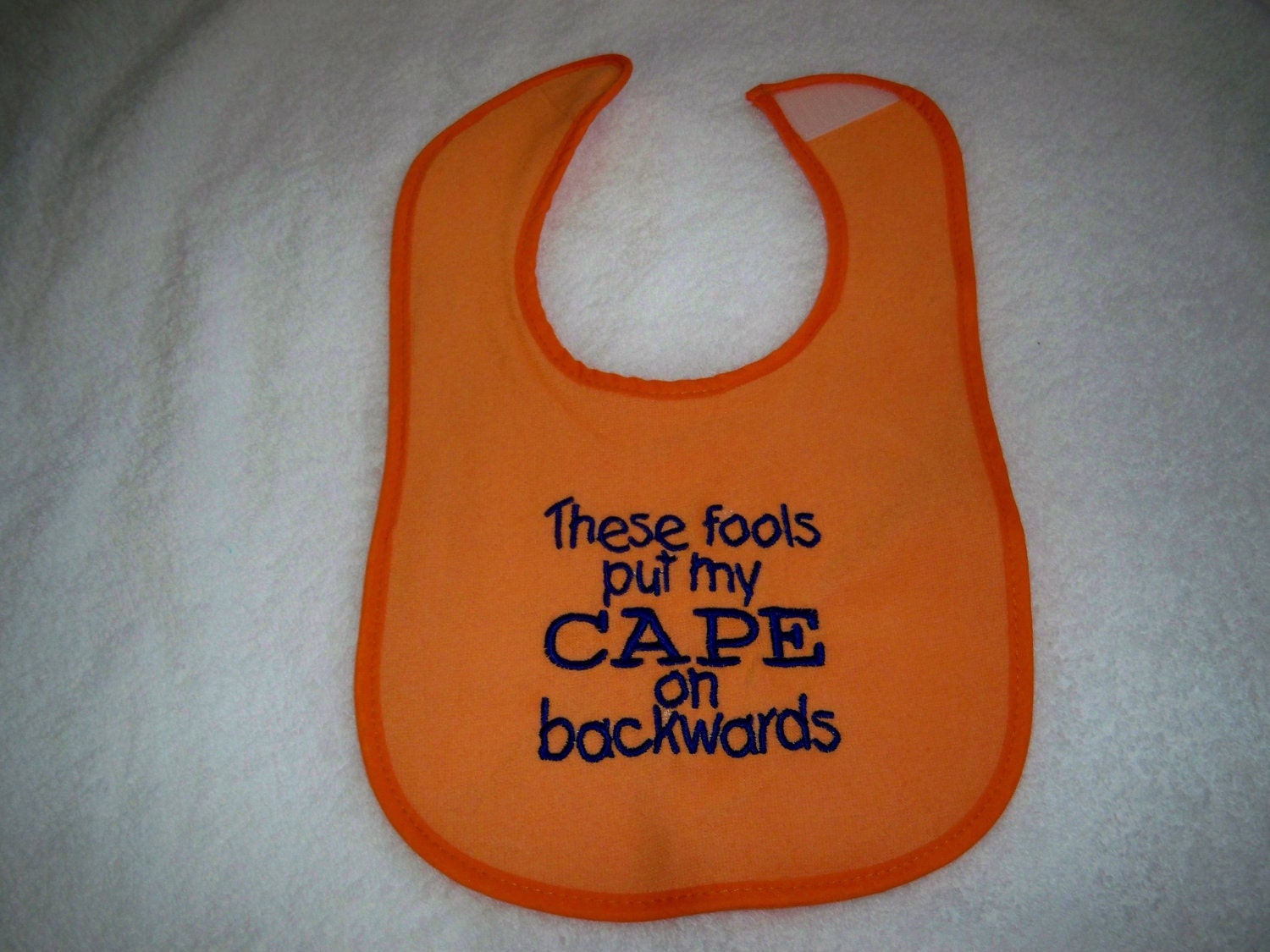 Orange & Navy Bib - These Fools Put My Cape on Backwards - Baby Girl or Boy Bib - Orange Bib with Navy Blue Embroidery