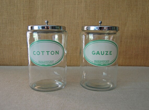 vintage medical or apothecary cotton and gauze glass jars