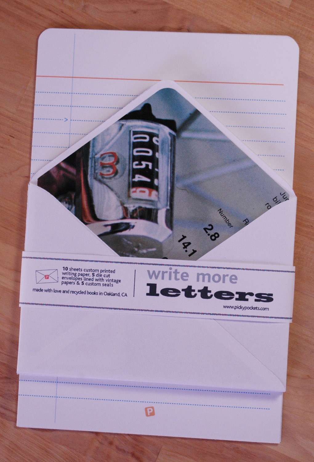 Made from a math book. Set of five die cut lined envelopes, 10 sheets custom lined paper, custom seals.