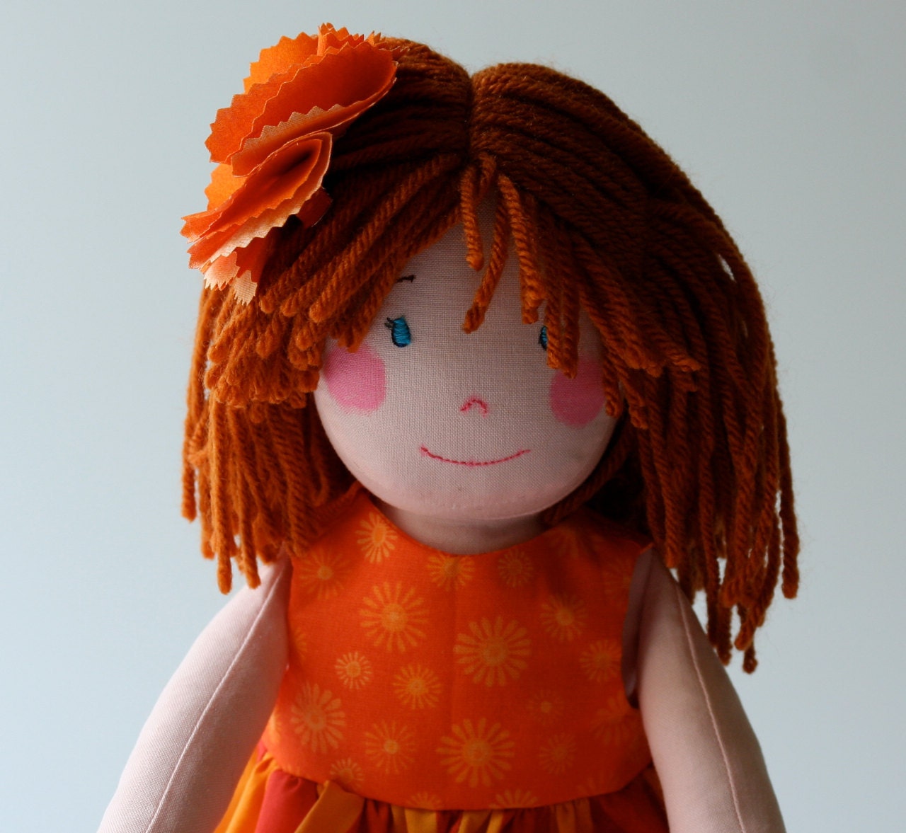 Rag Doll with red hair orange flower and leggings May