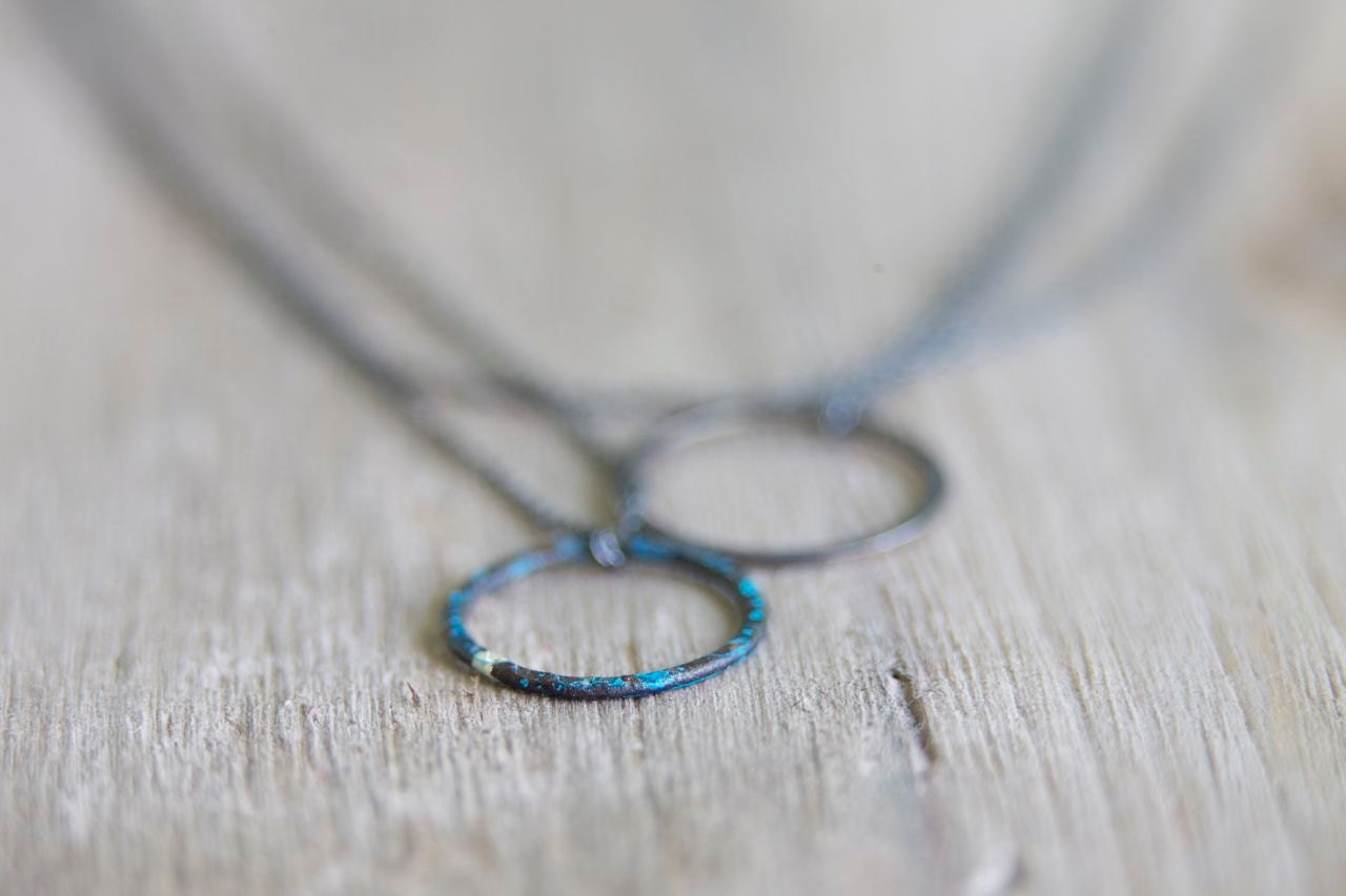 Two circles necklace: oxidized sterling silver and blue copper circles - modern jewelry