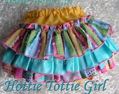 Pink Candy Ruffle Diaper Cover with Blue Greens, Yellows. Ruffle Bloomers & Sweet N Sassy Ruffle Pants  by Hottie Tottie Girl 6006