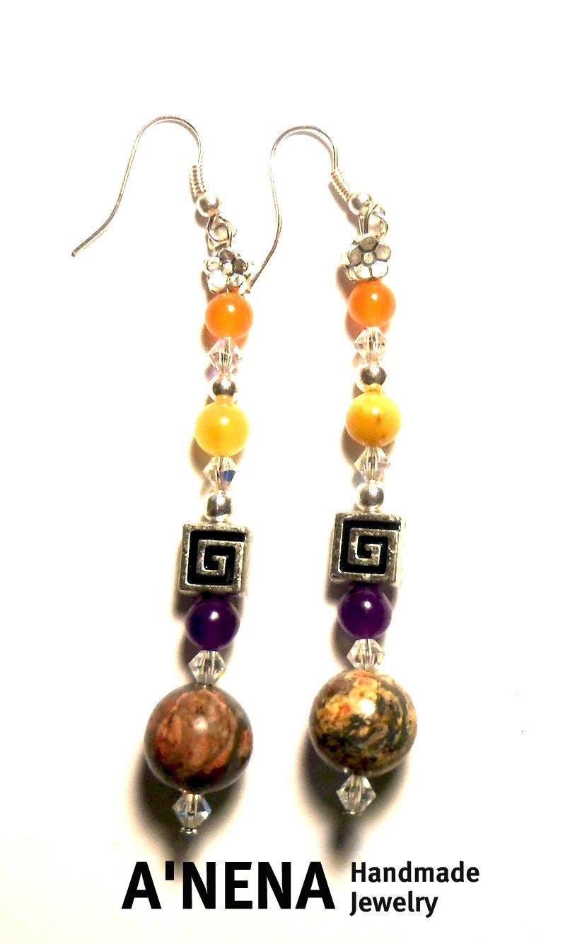 Earrings: Totem Ni -Ana(  Water and flower in Taino) Inspired by 15th Century Taino-Nitaino  Nobles  Petroglyphs