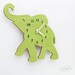 The "Baby Lime Green Elephant" designer wall mounted clock from LeLuni