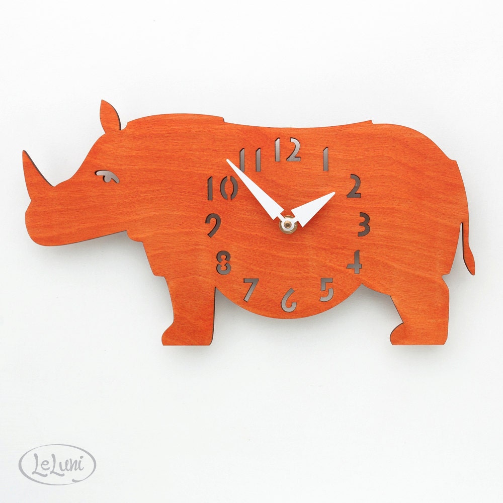 The "Rotund Rhino in Orange" designer wall mounted clock from LeLuni