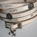 Humanity Love, Hope, Faith Cross Leather Wrap Bracelet Fleur de Lis