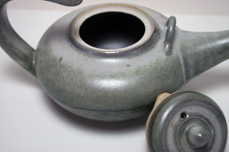 Floating handle teapot in two tone green