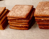 Twelve (12) handmade graham crackers with cinnamon sugar and clover honey