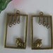 2 Bird on a Window in Bronze Pendants - 4507