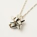 18 k starred node necklace