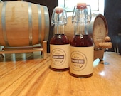 Two Small Bottles of Barrel Aged Maple Syrup