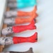 Set of Four Unusual art bookmarks. Legs in the book. for bookstore