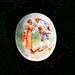 Vintage Brooch made in 1905, beautifully detailed painted porcelain brooch gentalman & lady courting