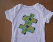 Puzzle Piece Applique on White Bodysuit