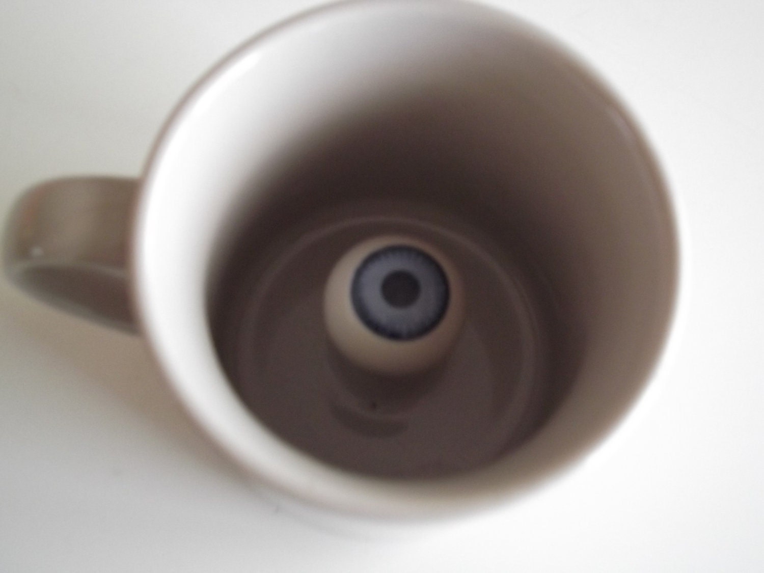 Bizarre Mug with Eyeball Looking At You. Perfect for April Fools