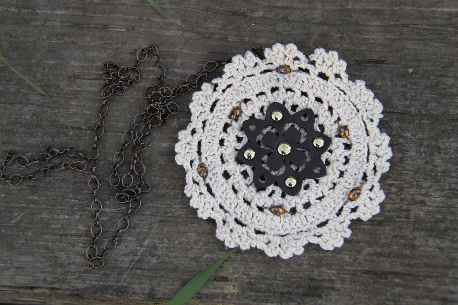 Bohemian-inspired brown and beige doily necklace.