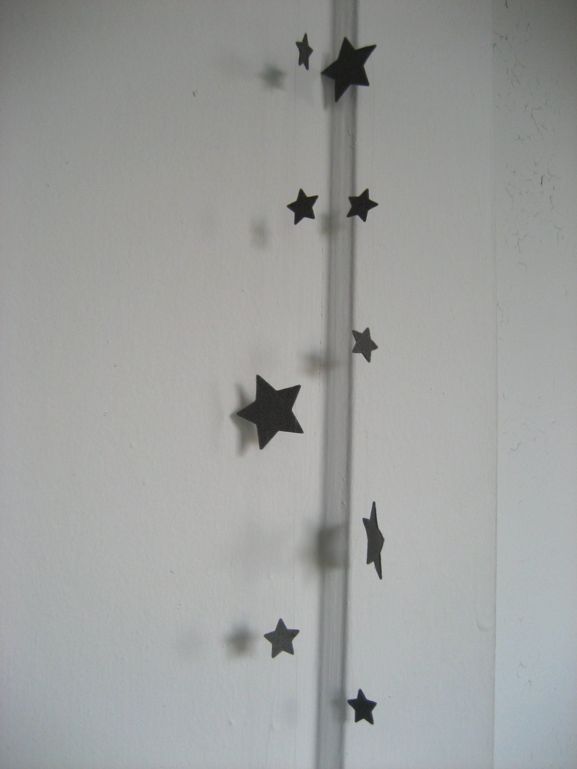 Wool felt star garland in grey