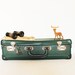 Vintage retro green suitcase