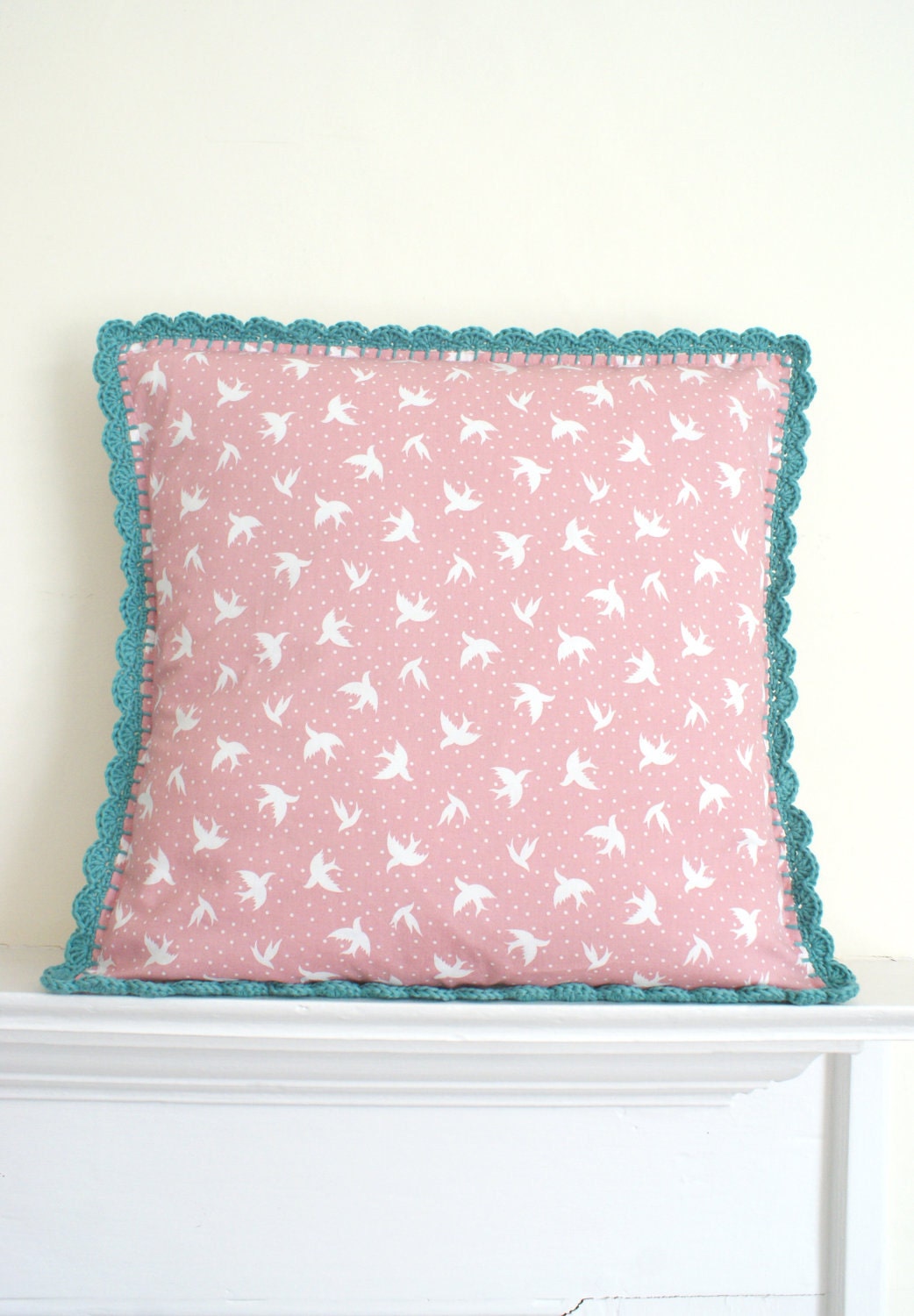Pink swallows cushion/pillow with crochet edge