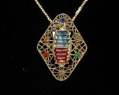 So Art Deco Vintage Pendant / Dress Clip  Worn On or Off Its Gold Chain Colored Glass Stones Spiderweb Design