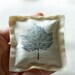 lavender pillows with stamped black woodland leaf for your bedroom dresser table, living room, thanksgiving decor hostess gift