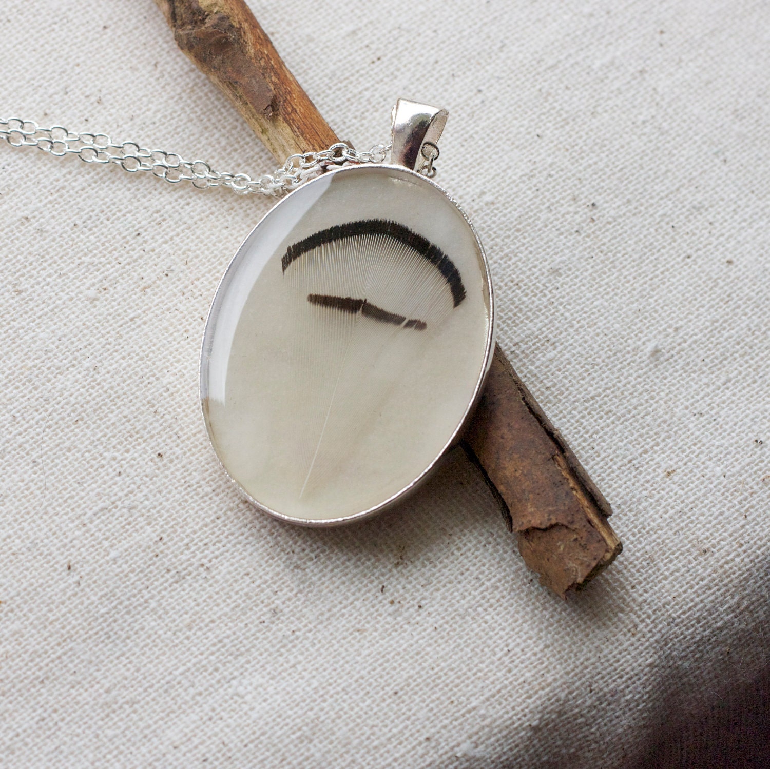 real feather resin necklace black and white Feather pendant sheen nature black and white cream set in silver bird woodlands