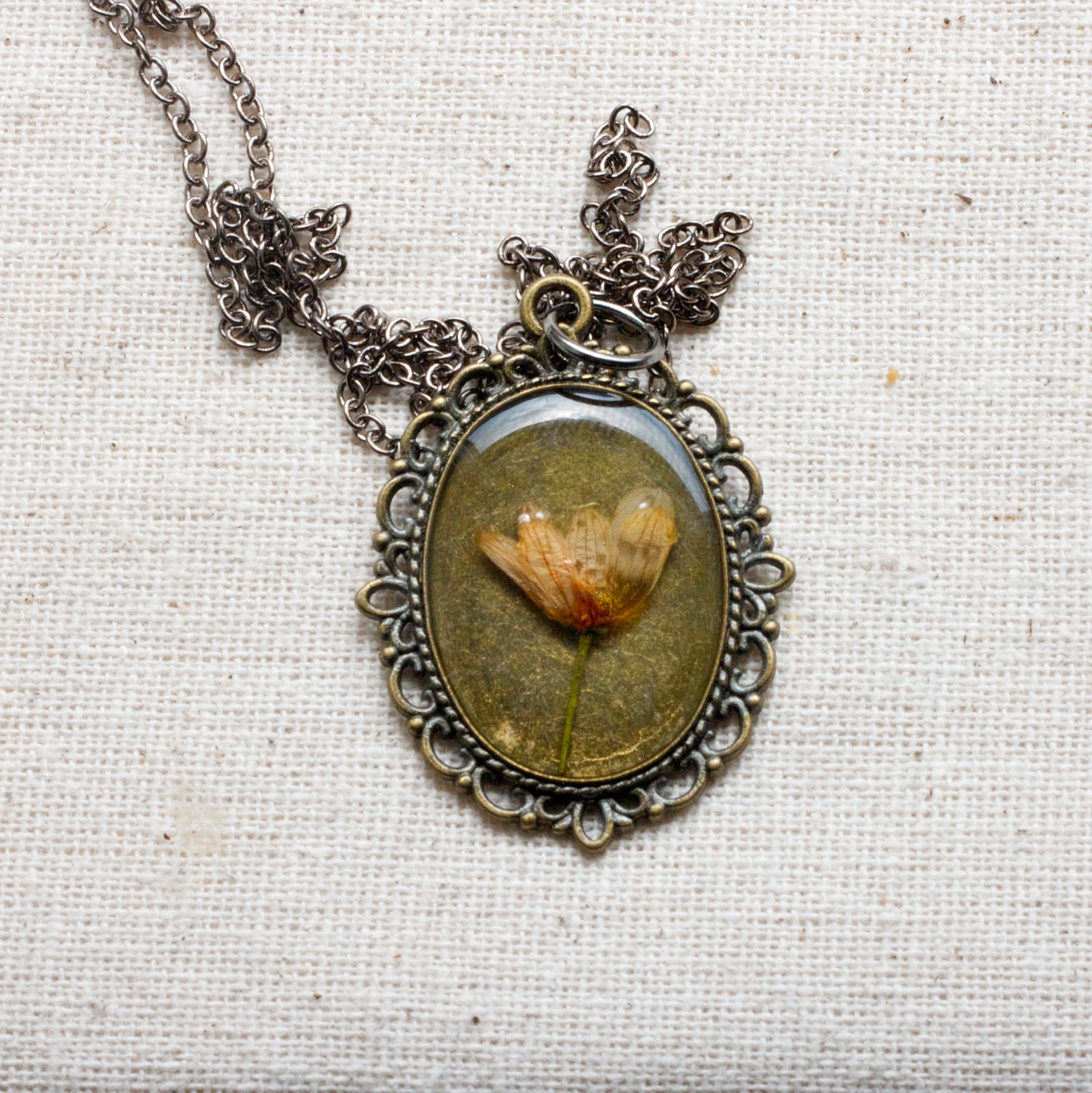 pressed flower necklace peach wildflower in bronze filigree setting resin jewelry shabby chic cottage farmhouse prairie
