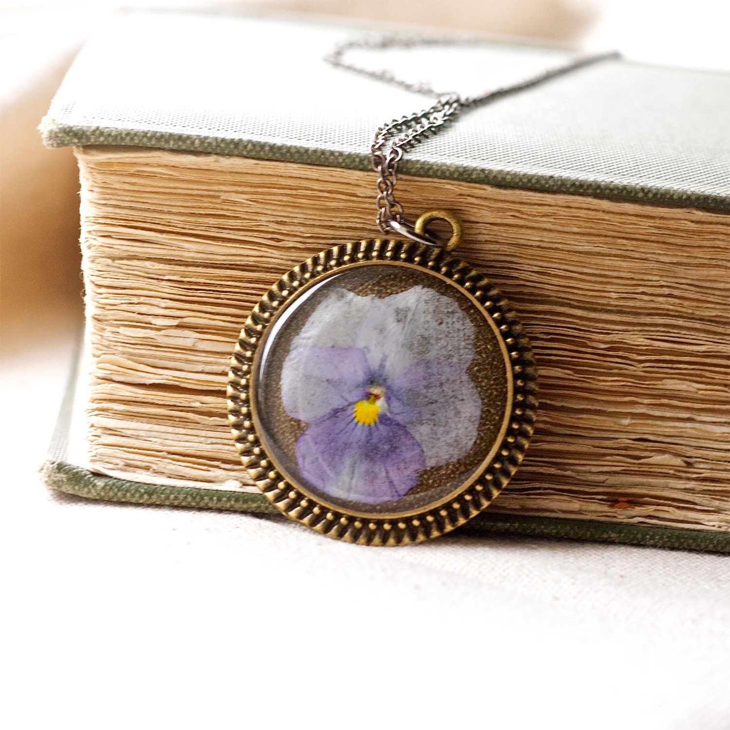 pressed flower necklace purple lavender pansy in resin jewelry circle filigree edge in bronze real natural nature botanical