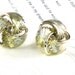 Vintage Lisner Soft Gold Earrings Round Textured Swirls Open Center Screwback