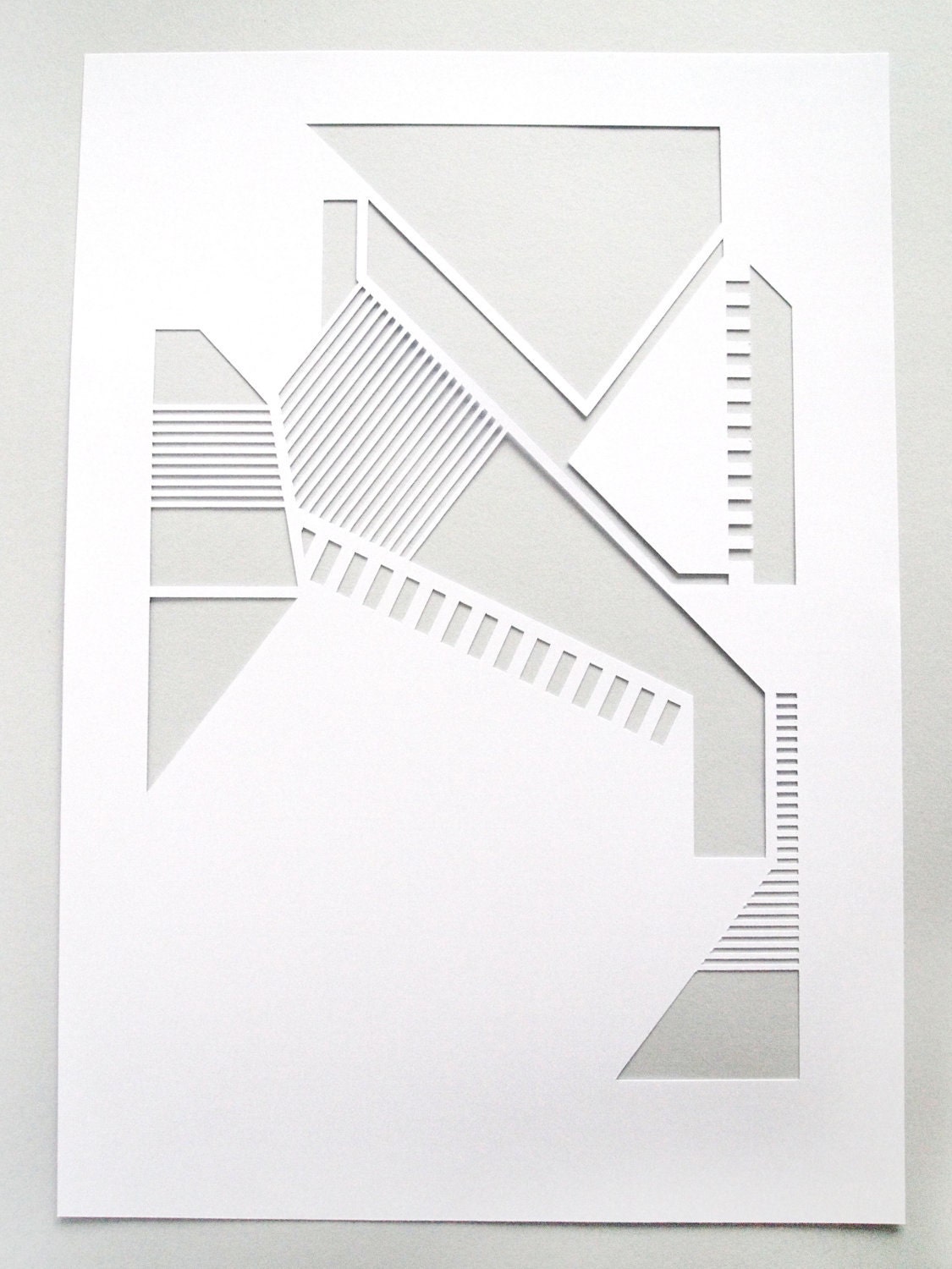 White geometric A4 papercut