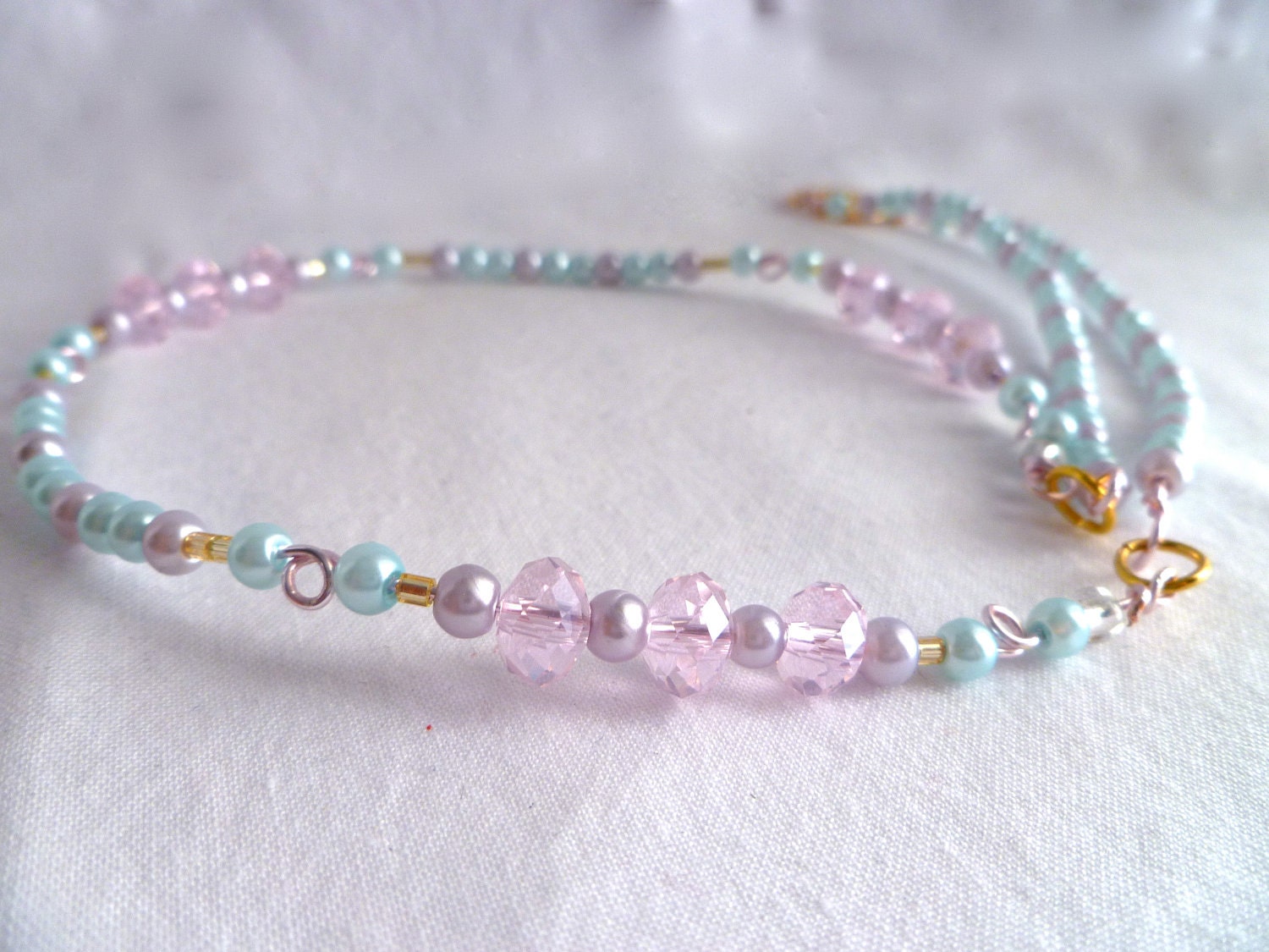 Light Blue and Purple Beaded Necklace with Pink Quartz Crystals