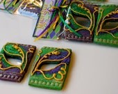 2 Mardi Gras Masks made from Bourbon-Pecan Shortbread Cookies
