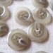 Cream, brown and gray swirl buttons -- lot of 52