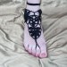 Black crochet leaves barefoot sandals.