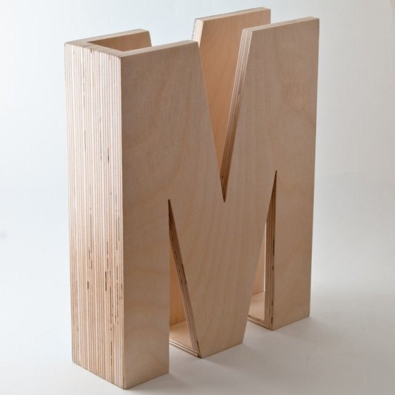 M is for magazine. In turquoise.