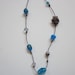 Discounted-Glass-Beaded Necklace on Purple Cord