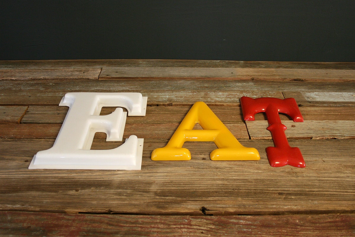 Sign Letters Spelling E.A.T.