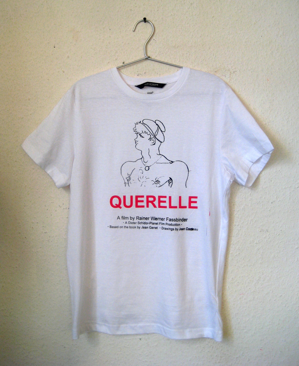 Fassbinder QUERELLE T-shirt - book by Jean Genet drawing by Jean Cocteau
