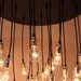 The Neely Round Industrial Chandelier with vintage bulbs
