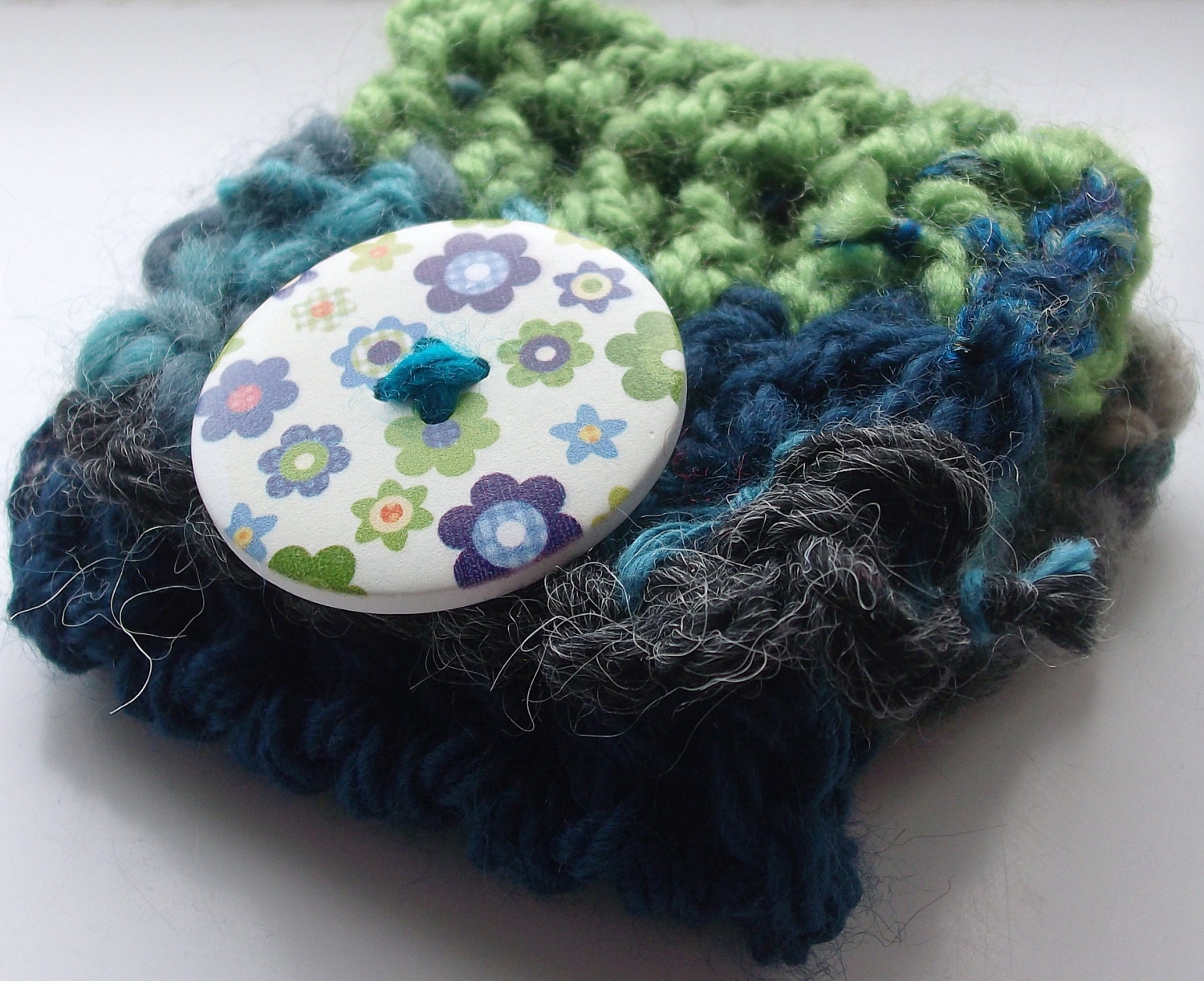 Unique Crochet Cuff: completely OOAK crocheted cuff in blue and green yarns, with blue / green flower button.