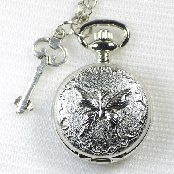 Items similar to silver butterfly pocket watch necklace with a little