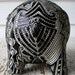 Lucky Elephant Bank -- White Ceramic Elephant with Black Embossed design on top.