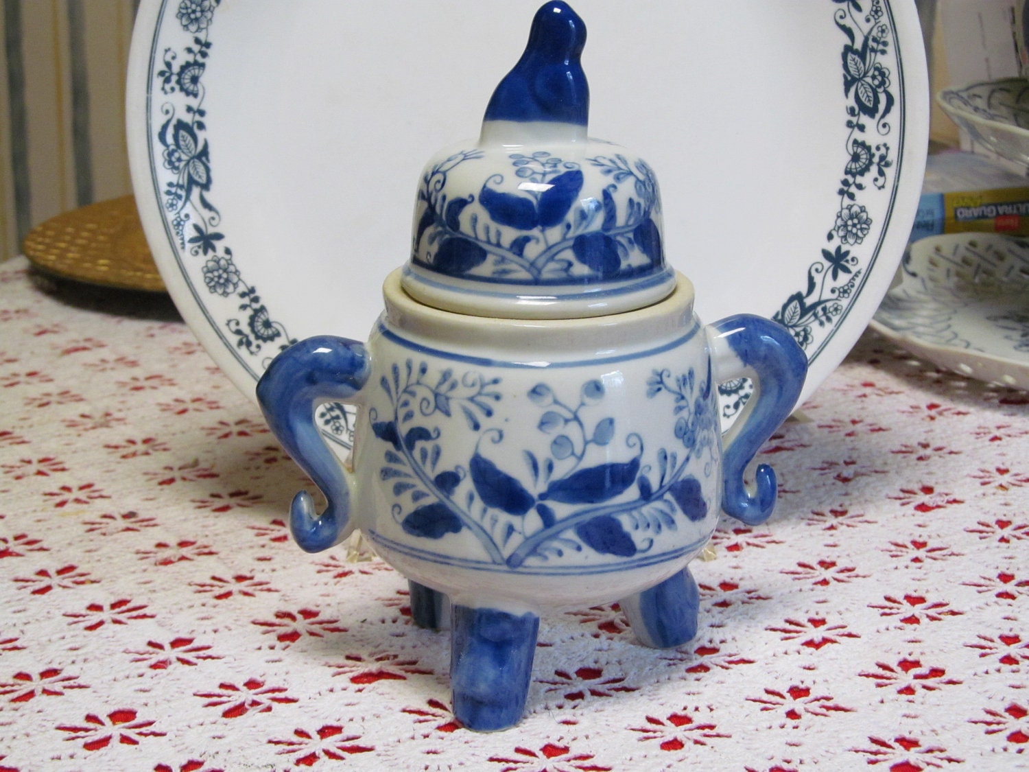 Blue and white 3-footed lidded jar
