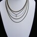 Multi Chain Necklace Bronze and Silver tone with small heart charm