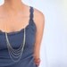 Dauphine D'eau:  Rain  necklace. Cascading layers of gold filled chain and an 18k gold plated rain cloud. A Long multi chain necklace