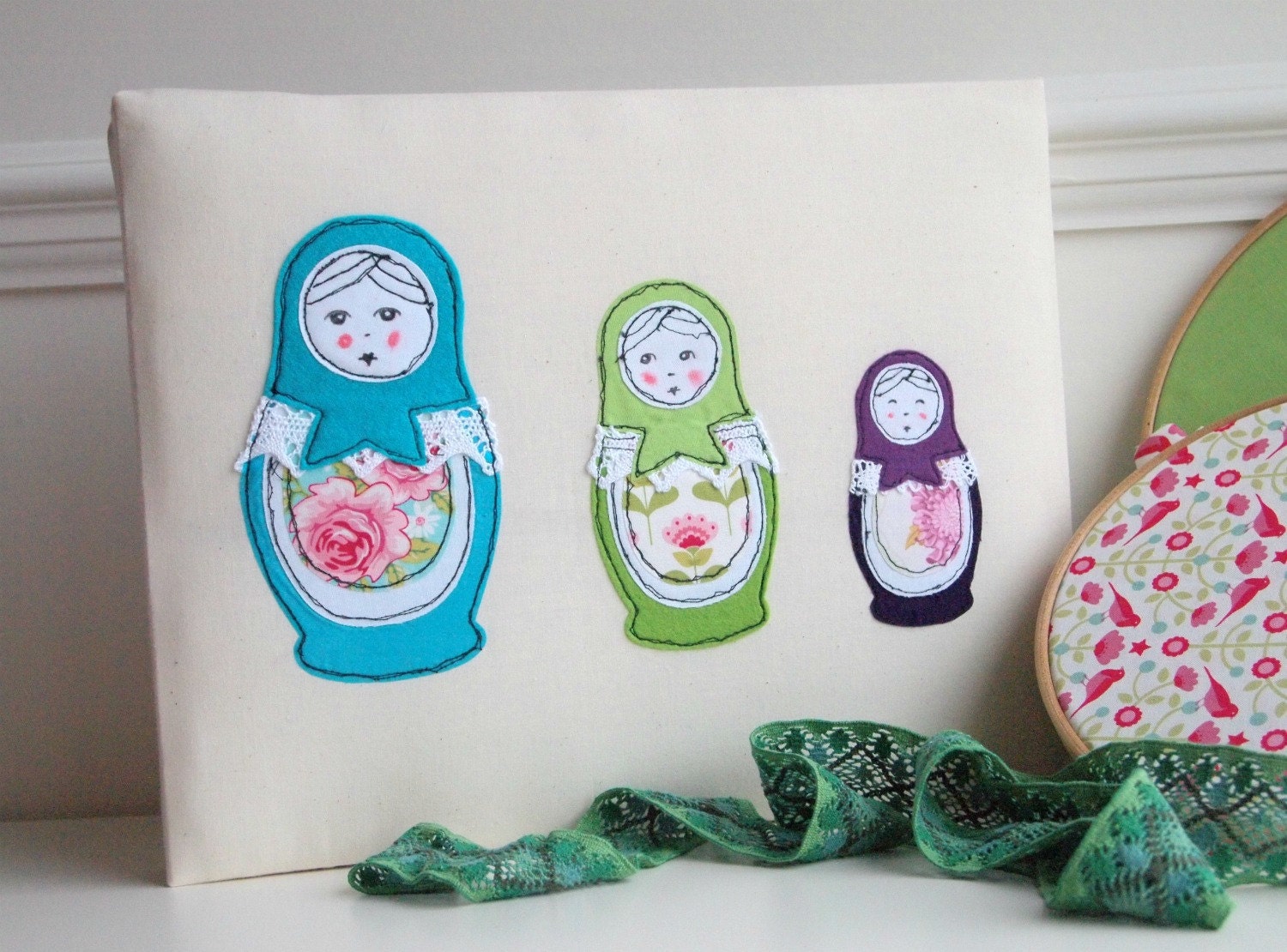Russian dolls freestyle machine embroidery on canvas