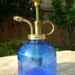 Gorgeous plant mister in blue glass and brass
